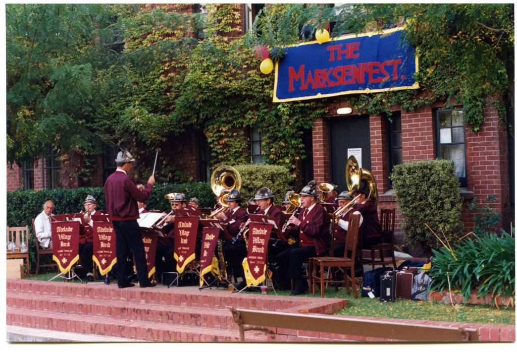 The Oompah Band playing beneath a hand-painted Marksenfest banner in 1991